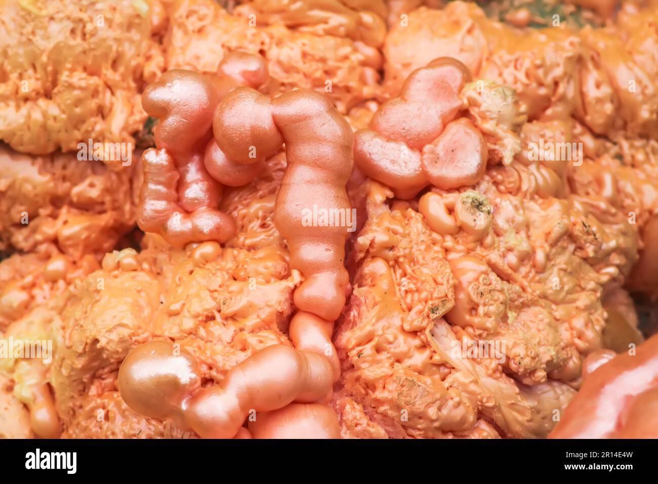 Spraying foam texture. Polyurethane foam close up. Stock Photo