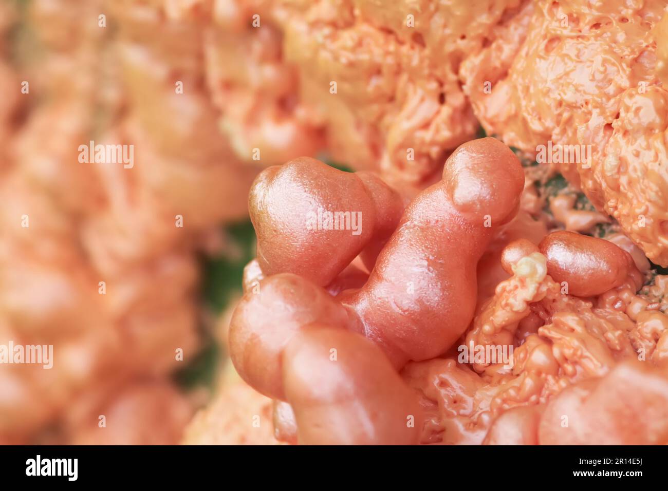 Spraying foam texture. Polyurethane foam close up. Stock Photo