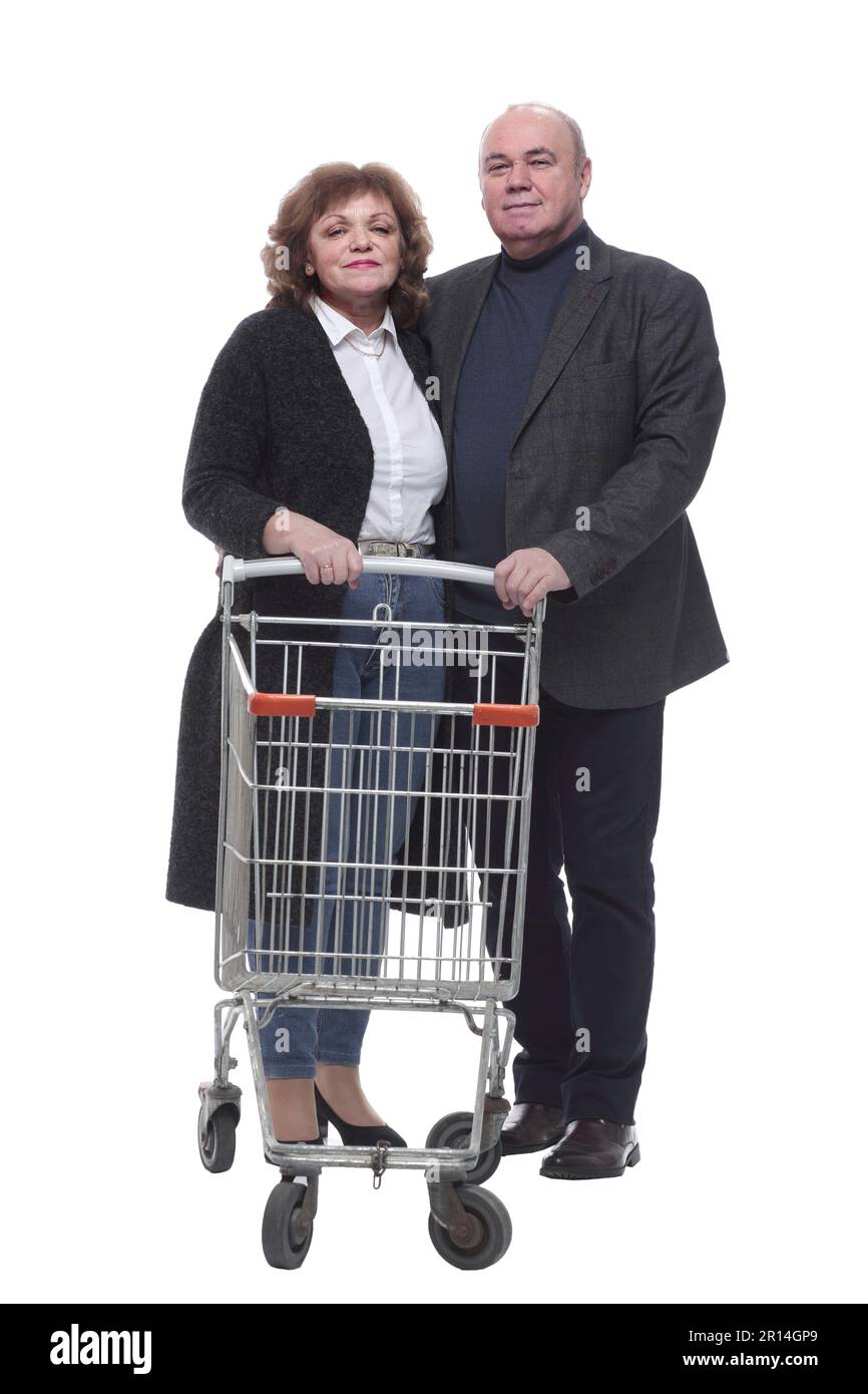 in full growth. an elderly couple with a shopping cart Stock Photo