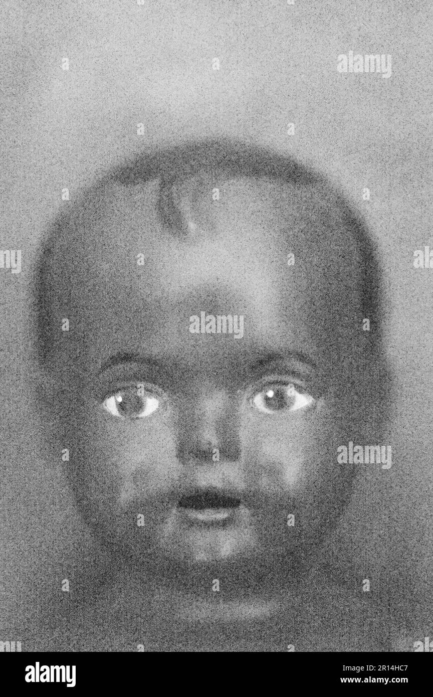 Soft and pencil like ] black and white image of 1970s black boy doll head with kiss curl Stock Photo