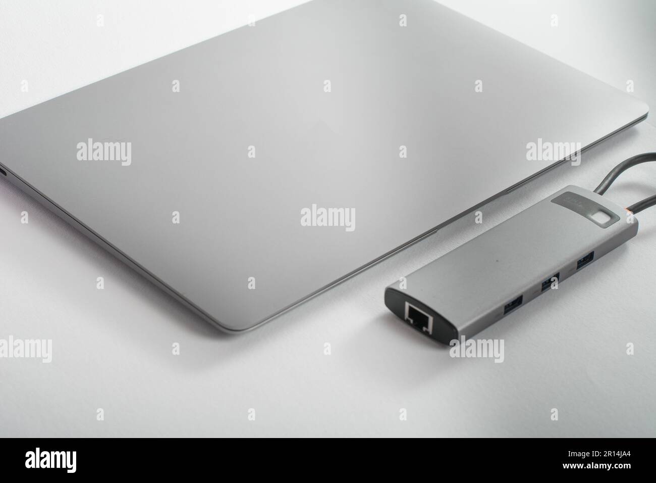 USB adapter connected to laptop with different inputs for flash drive