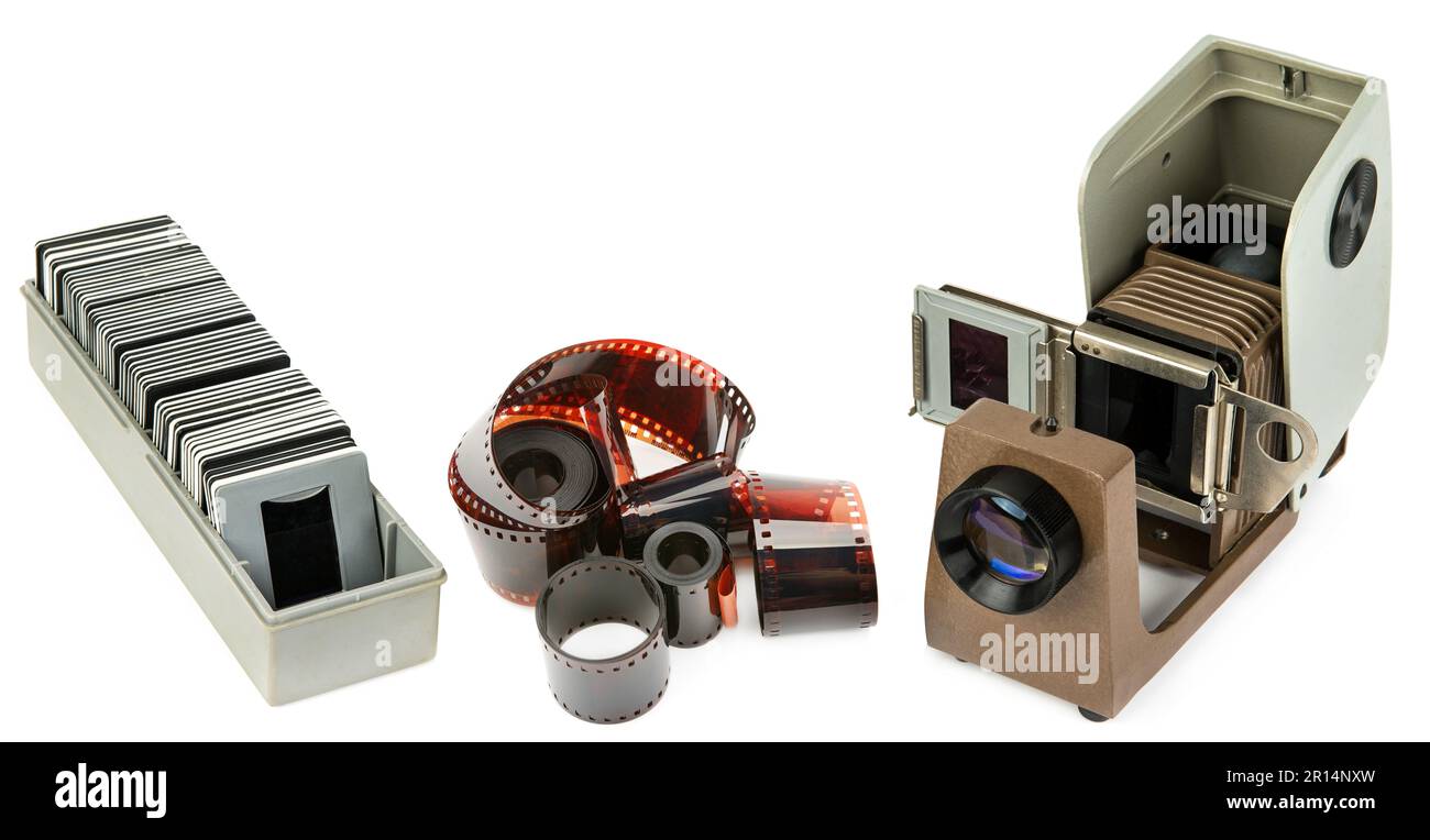 Slide projector, slides and photographic film isolated on white background. Collage. Stock Photo