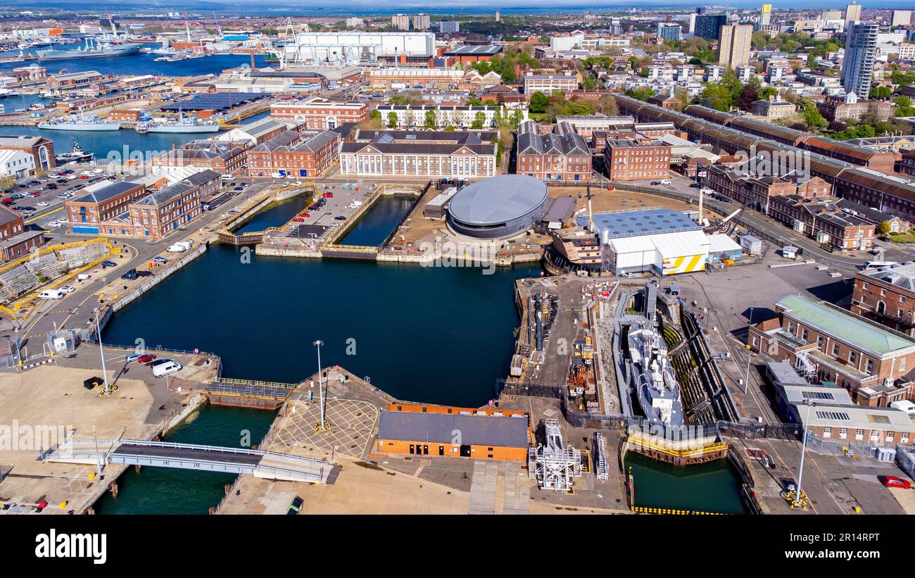 Aerial view of Portsmouth Historic Dockyard and the Royal Navy's ancient HMS Victory, the HMS M33 as well as the Mary Rose Museum on the English Chann Stock Photo