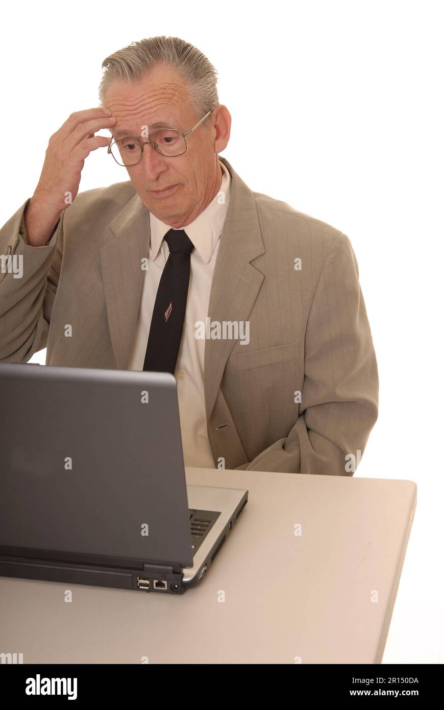 Senior businessman with a rather interesting expression Stock Photo - Alamy