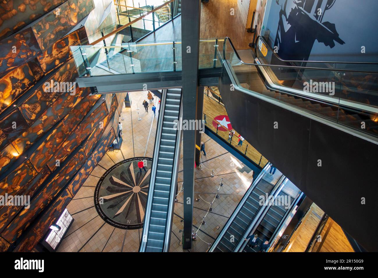 Staircase withing the entrance concourse of the Titanic Belfast Exhibition and Visitor Centre in Titanic Quarter, Belfast, Northern Ireland, UK Stock Photo