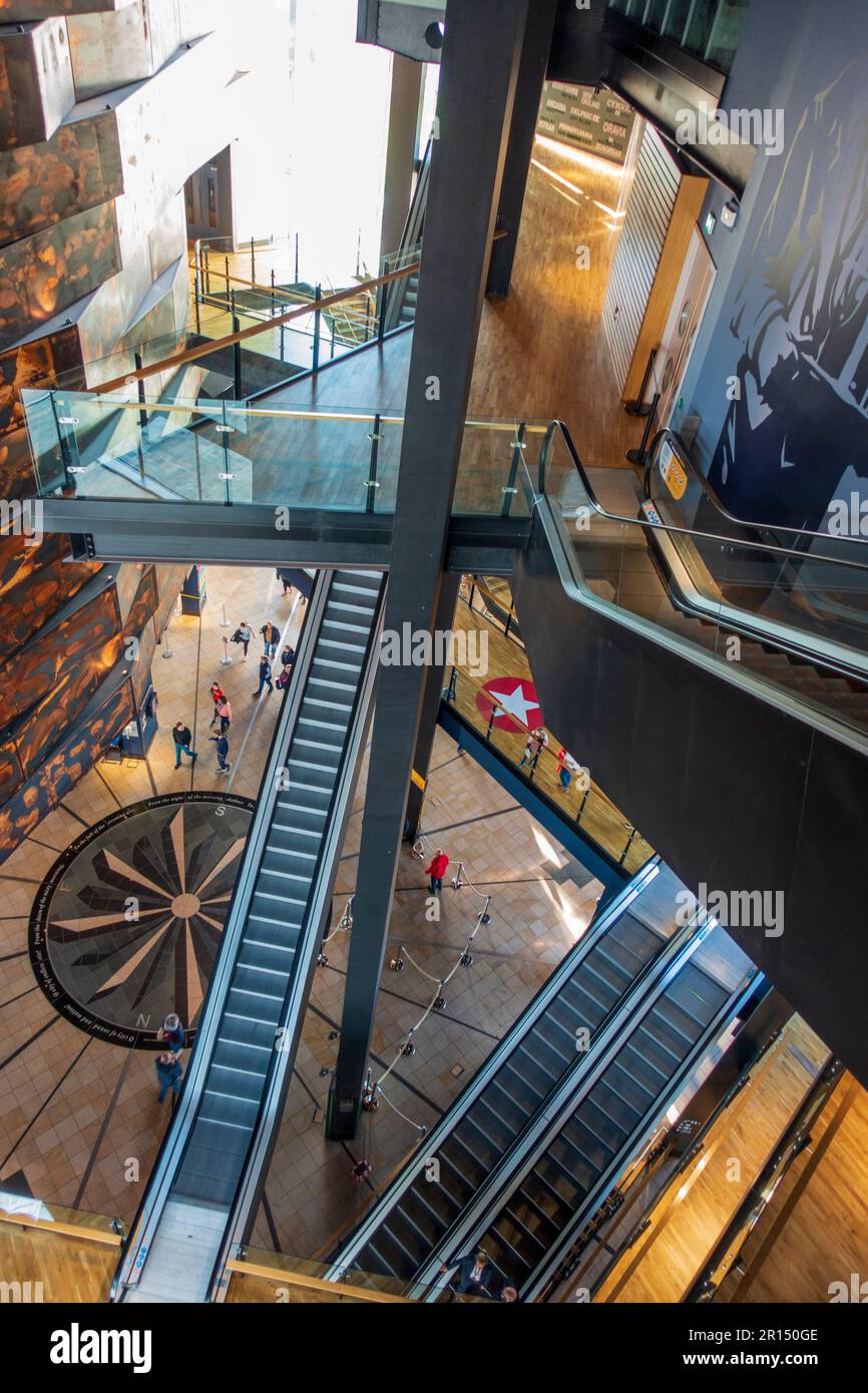 Staircase withing the entrance concourse of the Titanic Belfast Exhibition and Visitor Centre in Titanic Quarter, Belfast, Northern Ireland, UK Stock Photo