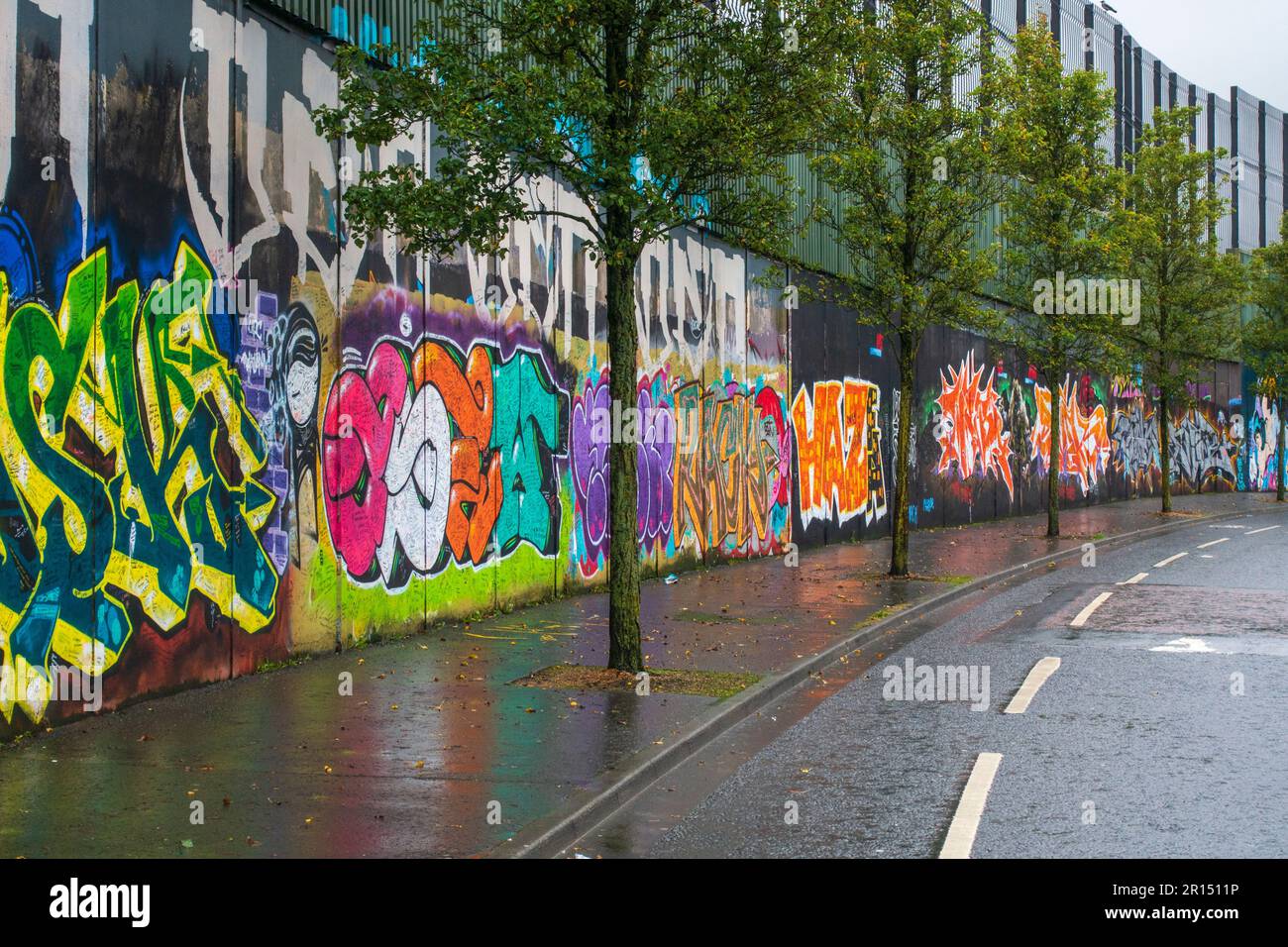 Peace wall on Cupar Way in West Belfast, Northern Ireland, UK Stock Photo