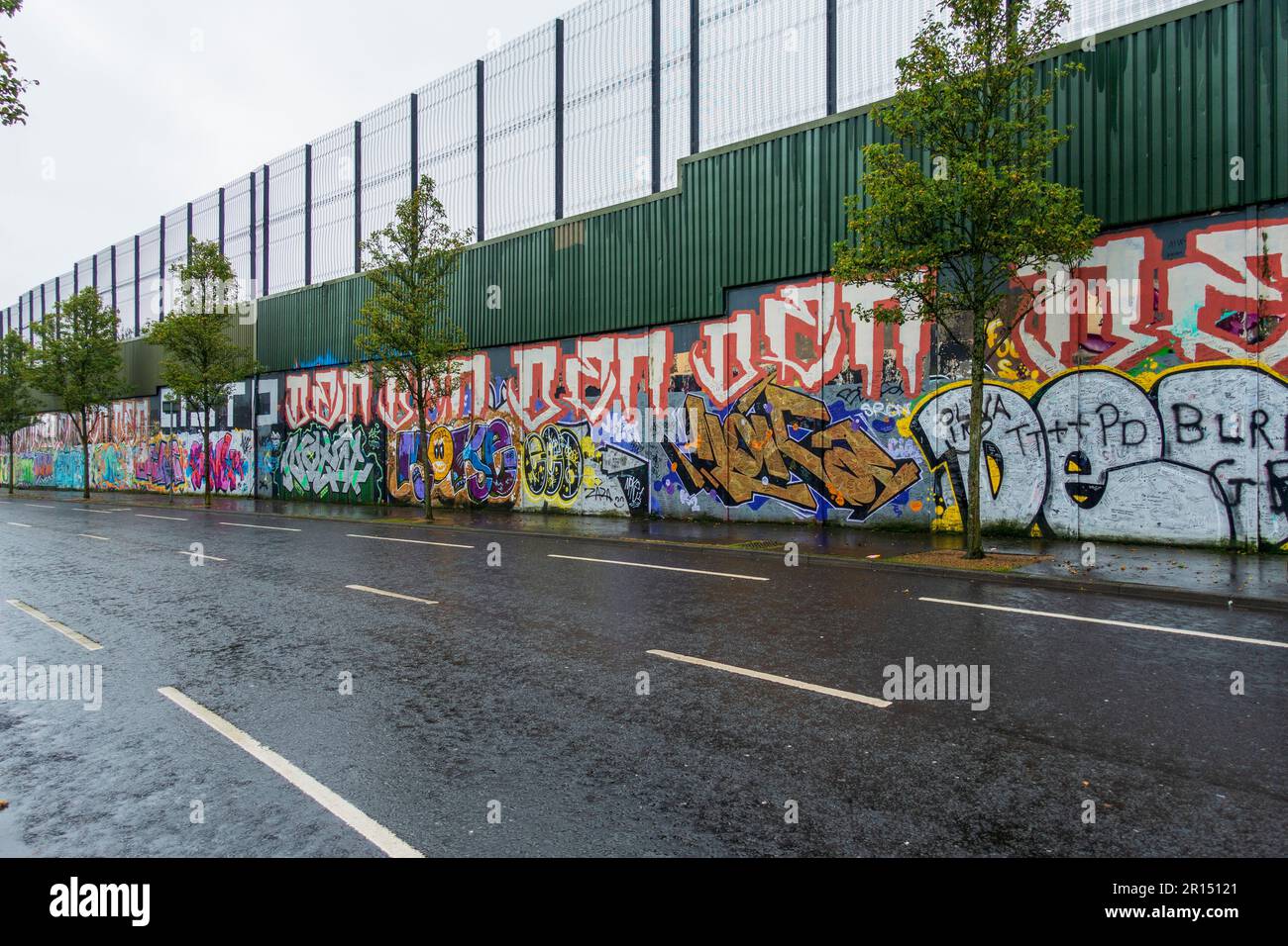 Peace wall on Cupar Way in West Belfast, Northern Ireland, UK Stock Photo