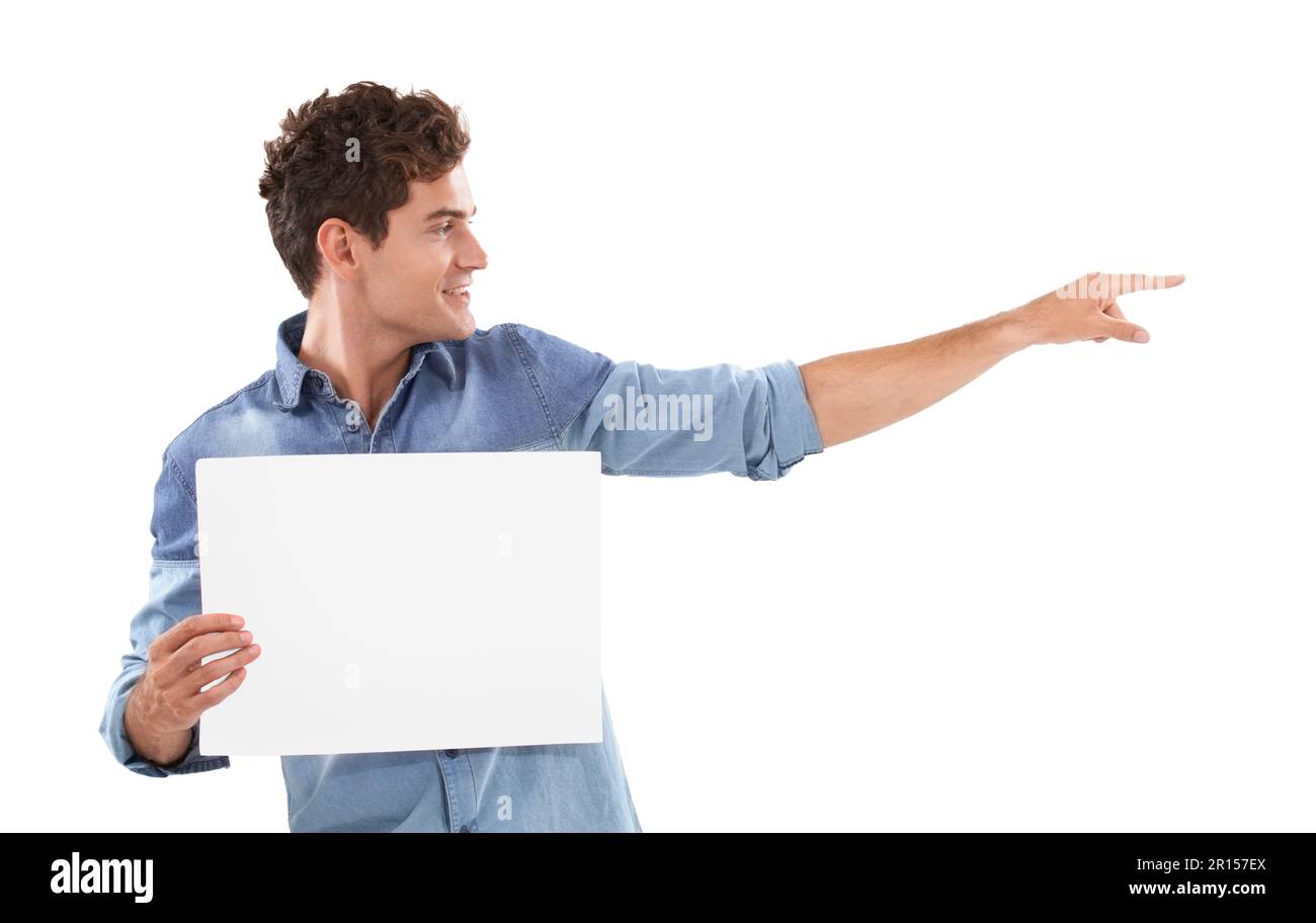Pointing you in the right direction. A young man holding a placard and pointing away. Stock Photo