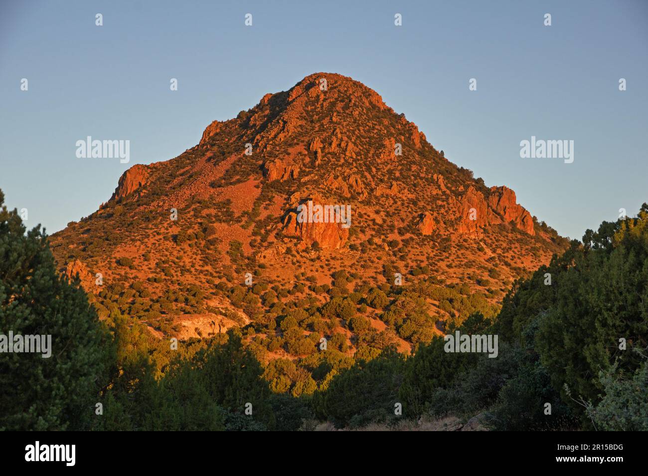 Mount Floyd in Northern Arizona lit up by early morning light Stock Photo