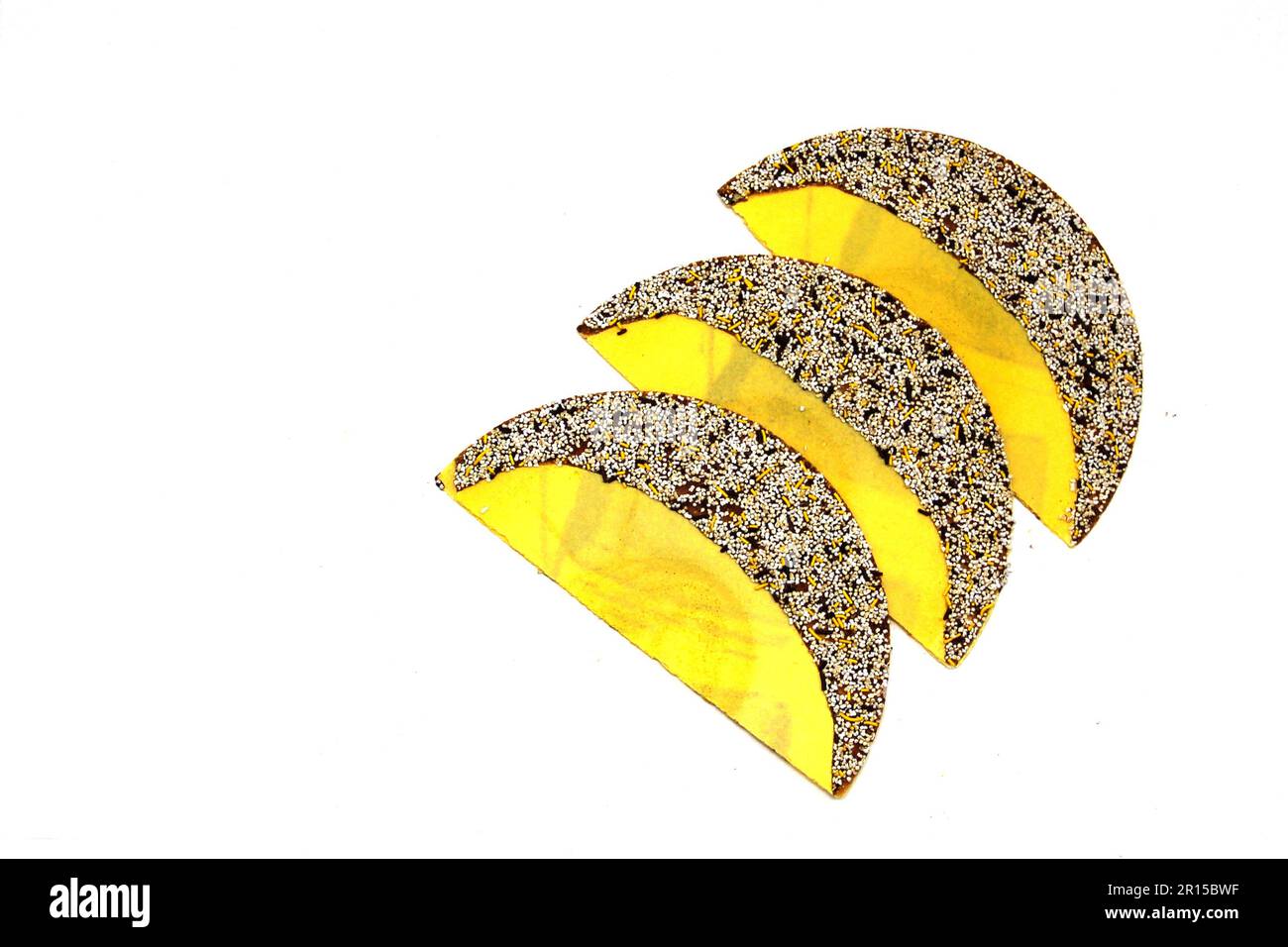 Typical Mexican sweet Pepitorias yellow wafers with chocolate and