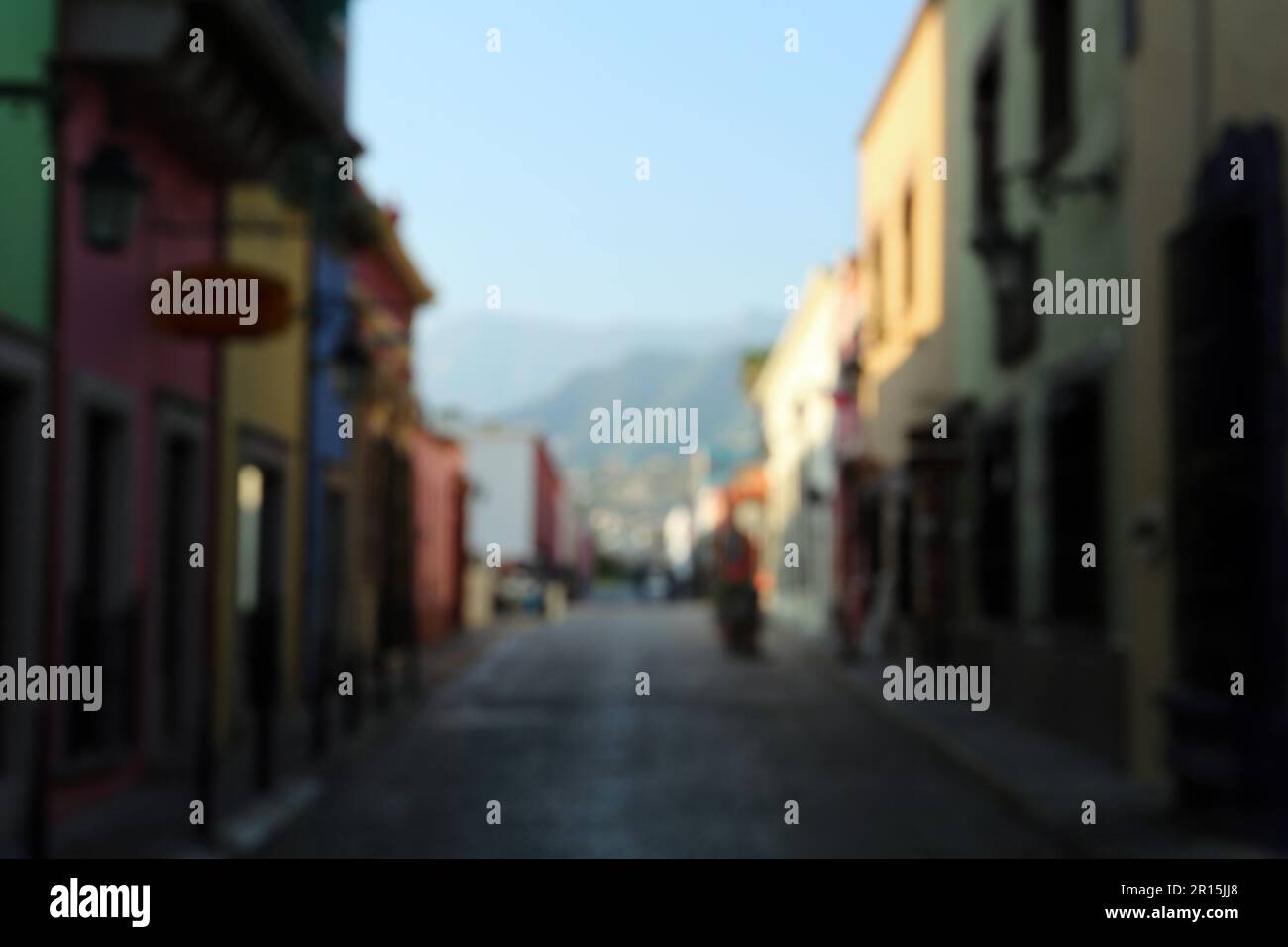 Blurred view of city street with old buildings Stock Photo - Alamy