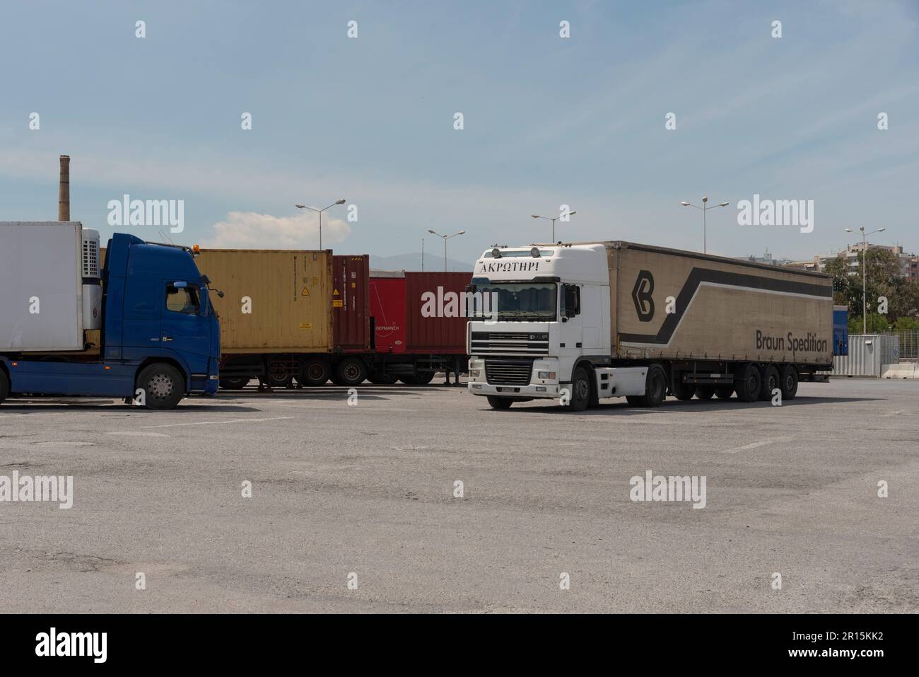 Heraklion, Crete, Greece, EU. 2023.  Cabs and trailers waiting  in a port lorry park to load onto an inter island ferry. Stock Photo