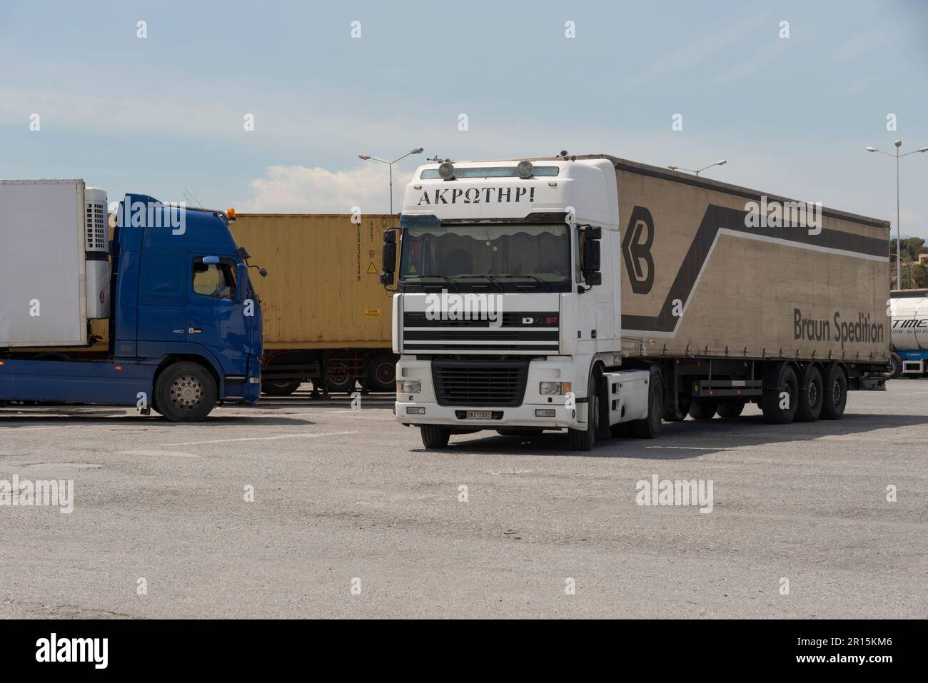Heraklion, Crete, Greece, EU. 2023.  Cabs and trailers waiting  in a port lorry park to load onto an inter island ferry. Stock Photo