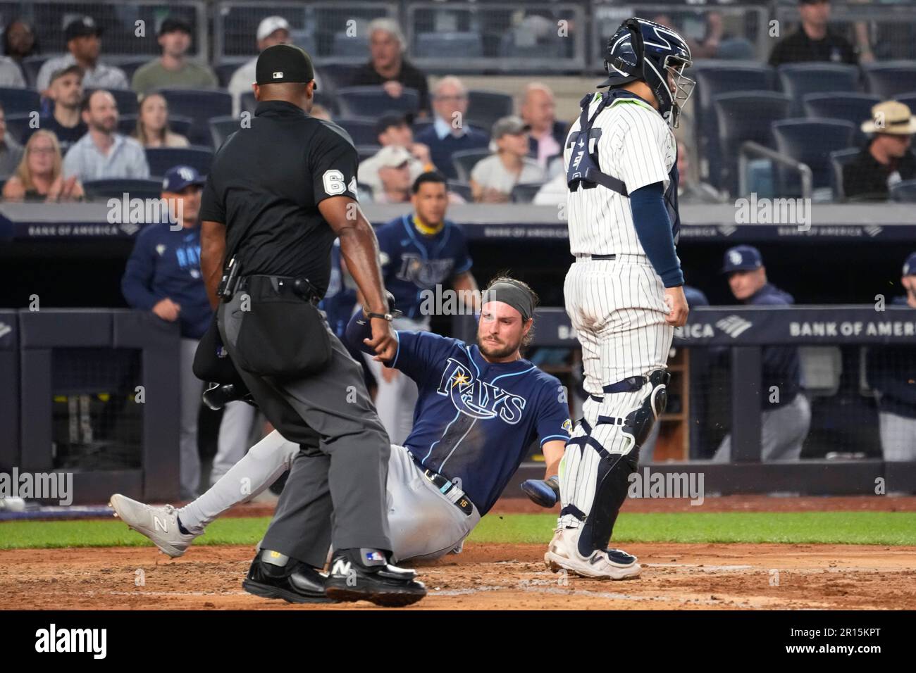 Tampa Bay Rays' Josh Lowe scores on a double by Yandy Diaz against the