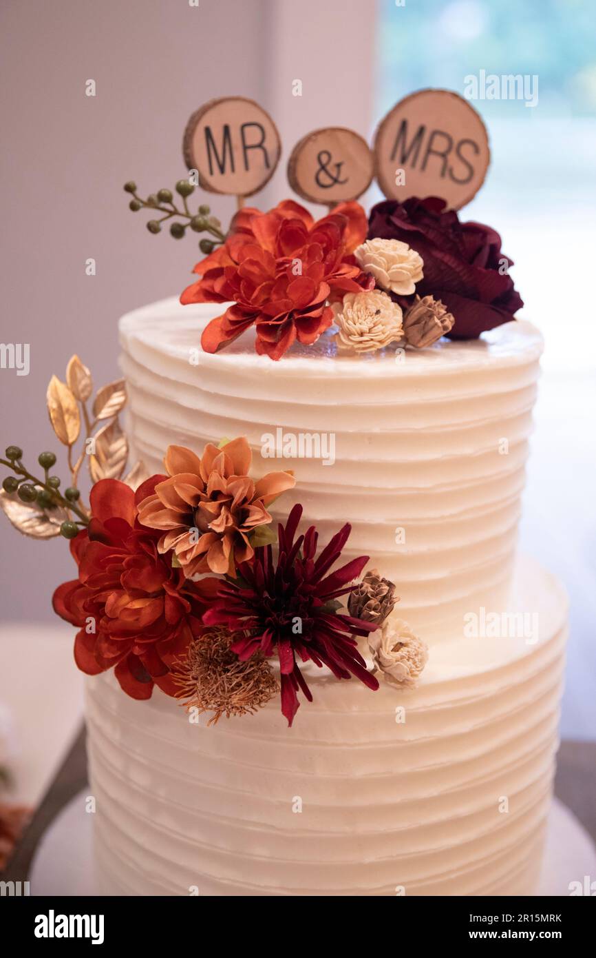 beautiful wedding cake, orange, brown, gold, and burgundy flowers, Mr