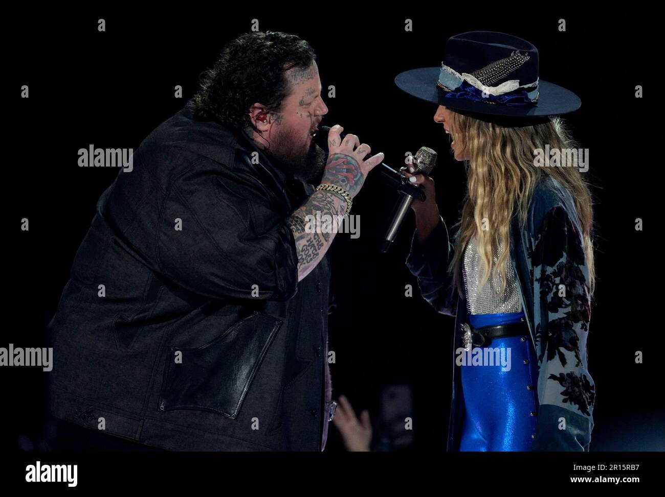 Jelly Roll Left And Lainey Wilson Perform Save Me At The 58th Annual Academy Of Country 5476