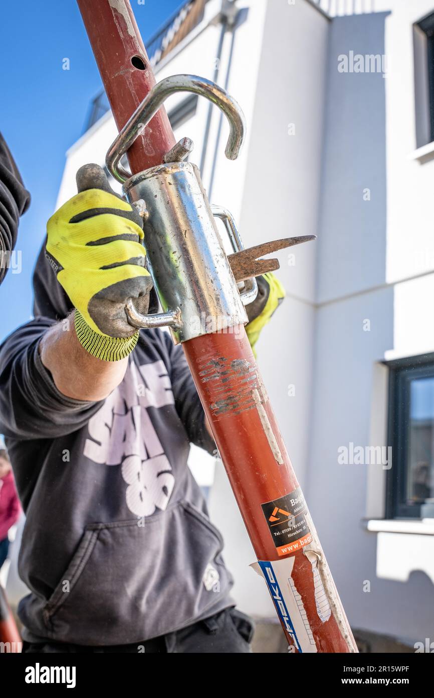 Man working on construction site, Calw, Germany Stock Photo