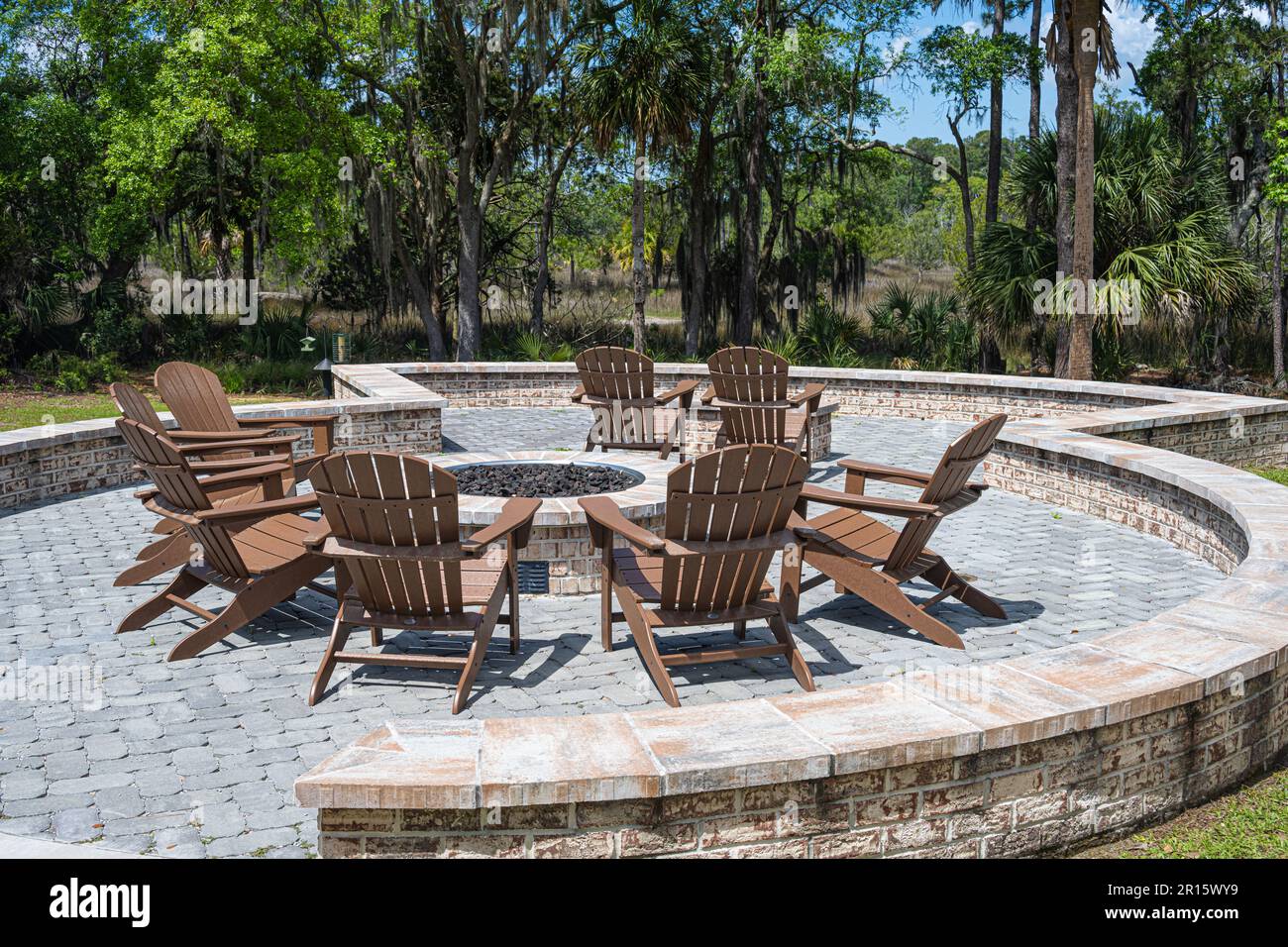 Adirondack chairs around a fire pit at the Skidaway Island State Park