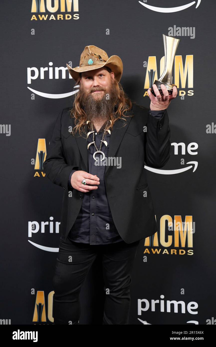 Chris Stapleton Poses With The Award For Entertainer Of The Year In The 