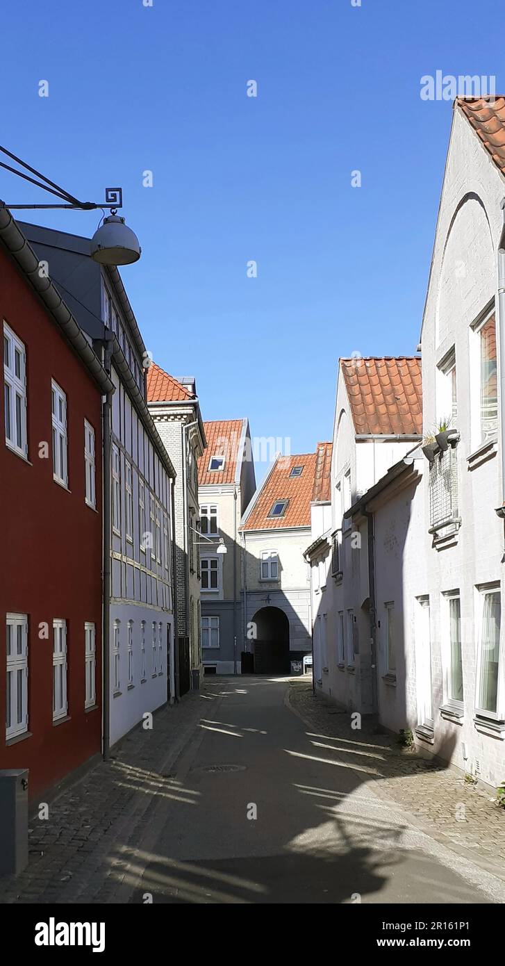 Morning shot of colored houses on a alley in the small town of