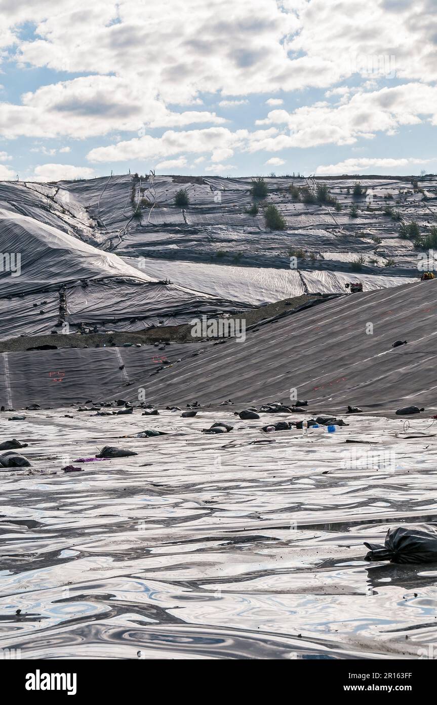 Geomembranes cover a lot of ground in an active landfill Stock Photo