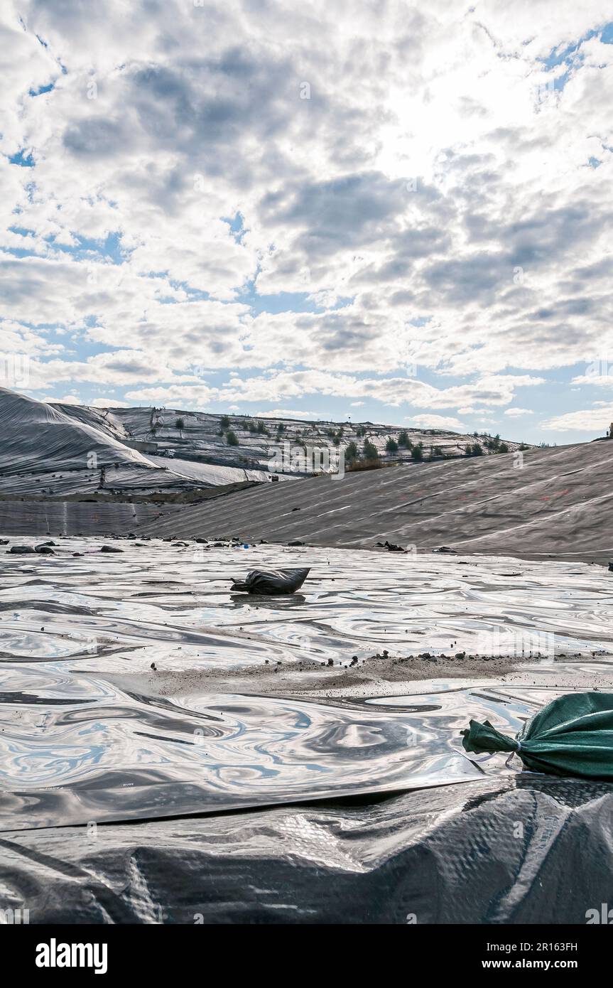 Geomembranes cover a lot of ground in an active landfill Stock Photo