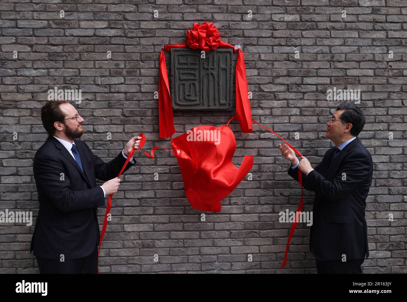 Paris, France. 11th May, 2023. Chinese State Councilor and Foreign Minister Qin Gang (R) inaugurates the Maison de la Chine (House of China) of the International University Campus in Paris, France, May 11, 2023. Credit: Gao Jing/Xinhua/Alamy Live News Stock Photo
