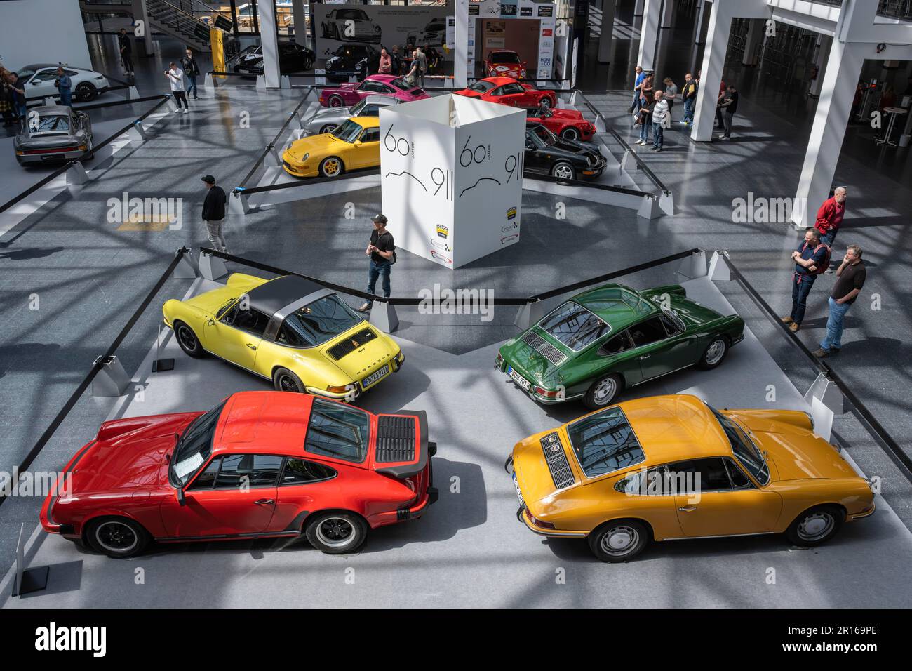 Porsche 911s lined up for presentation in an exhibition hall, Klassikwelt Lake Constance 2023, Friedrichshafen, Bodenseekreis, Baden-Wuerttemberg Stock Photo