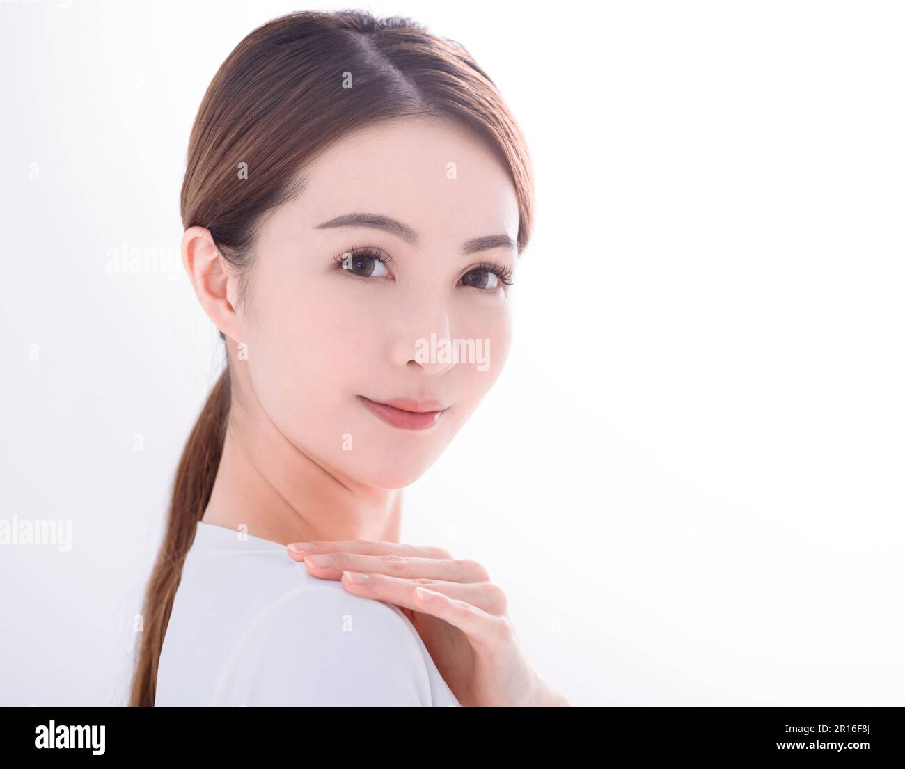 Beautiful young woman with clean fresh skin on white background Stock ...