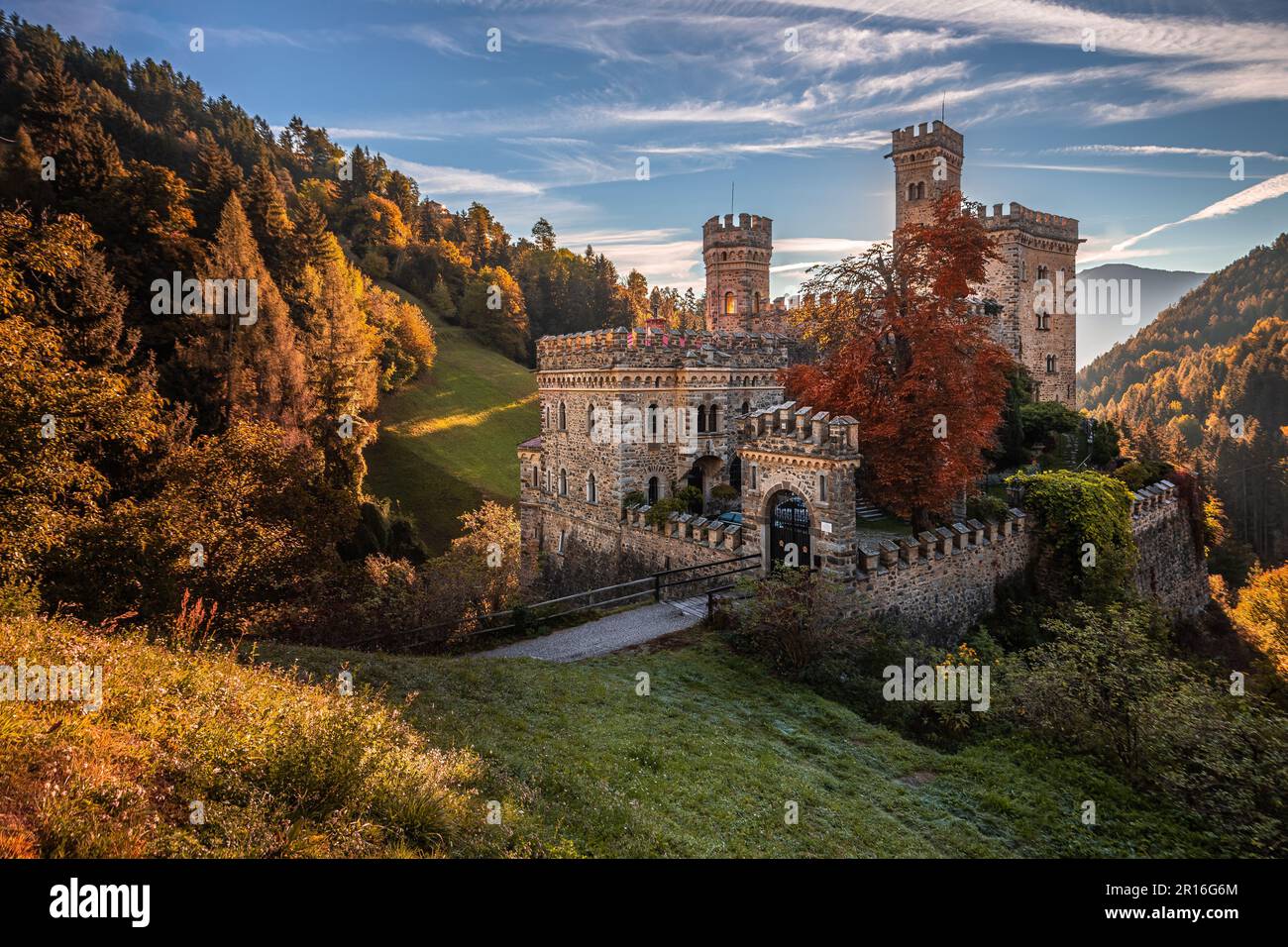 Latzfons, Italy - Beautiful autumn scenery at Gernstein Castle (Castello di Gernstein, Schloss Gernstein) at sunrise in South Tyrol with blue sky Stock Photo