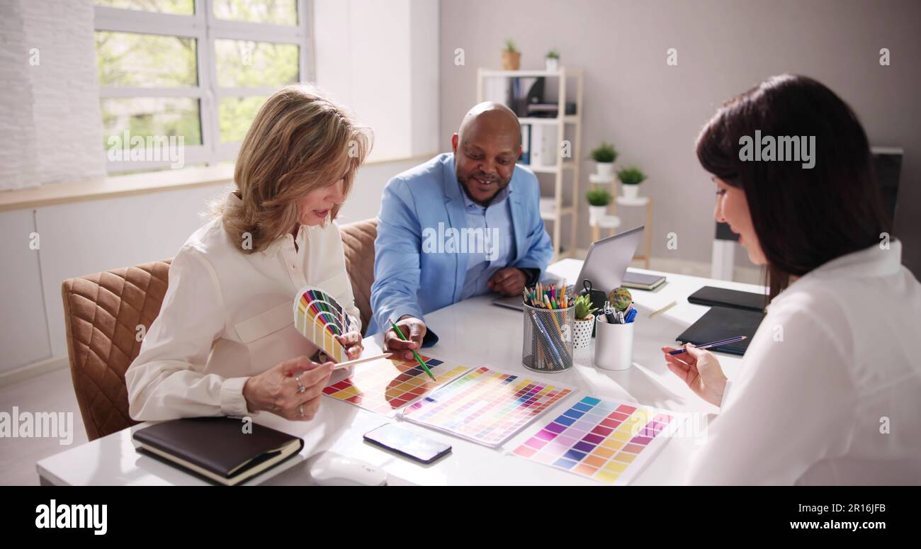 Business Group At Workplace. Designers Team Working Stock Photo