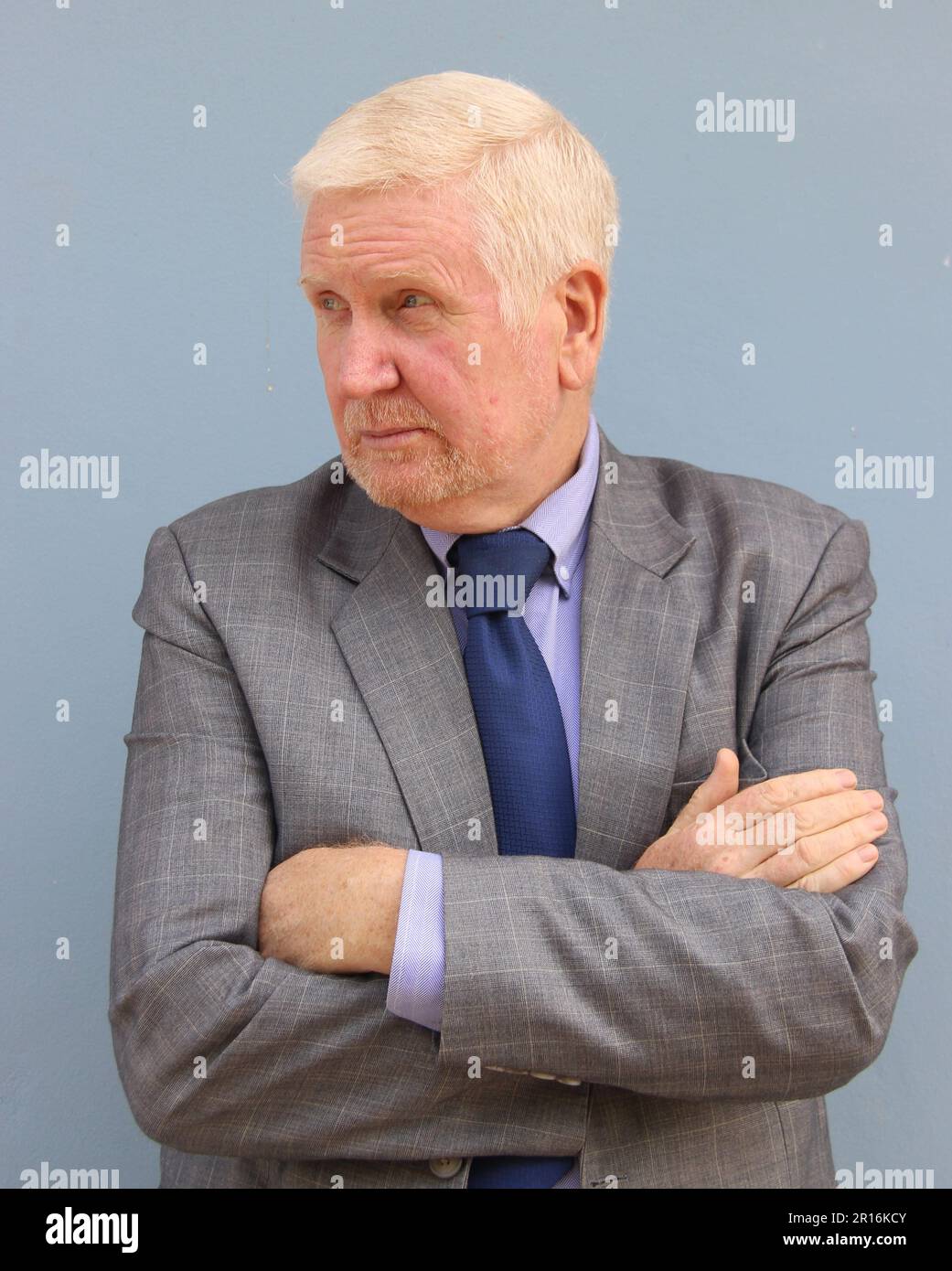 Senior blonde male in various poses Stock Photo