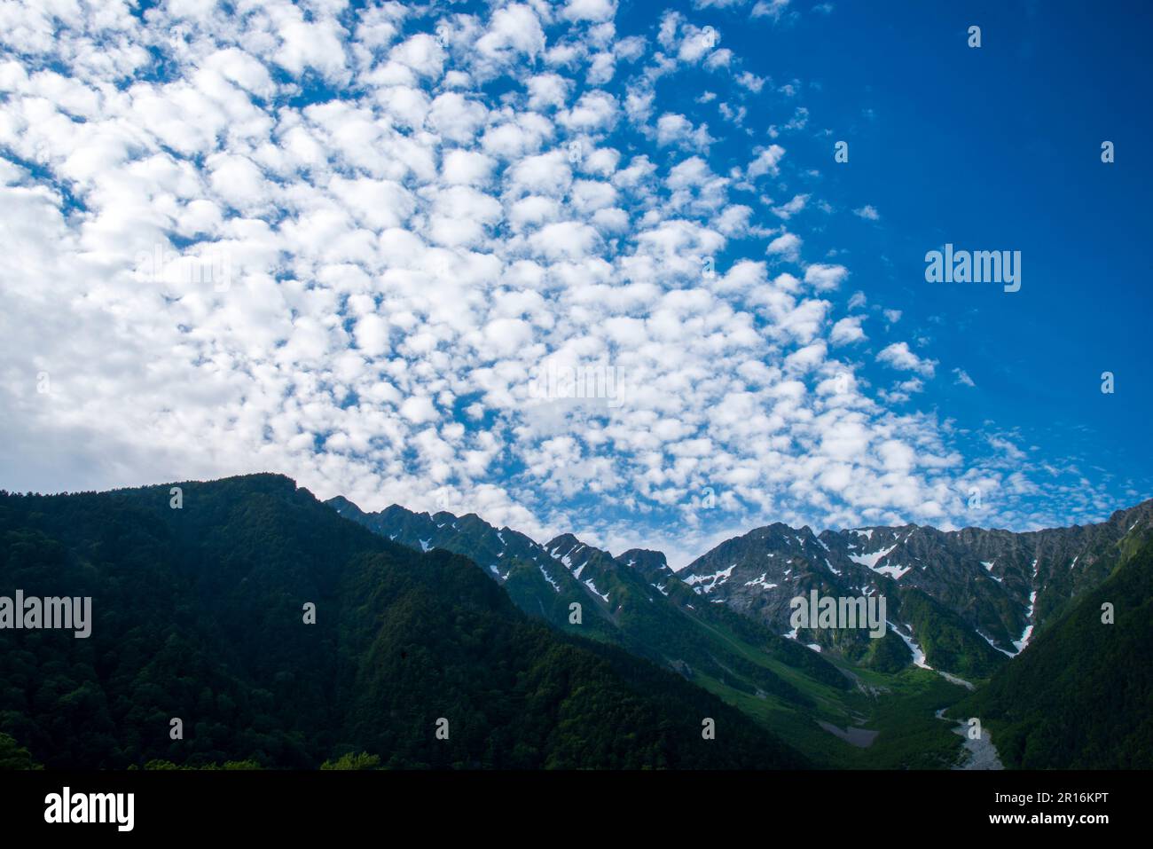 Cirrocumulus clouds and Hotaka Mountain Range Stock Photo