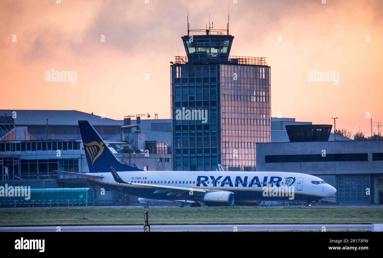 Cork Airport, Cork, Ireland. 12th May, 2023. A Ryanair Boeing 737 prepares to depart for London Stansted at dawn in Cork Airport, Cork, Ireland. - Picture; David Creedon Stock Photo