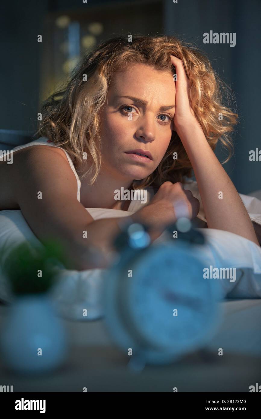 Sleep Less Female sleepless woman suffering from insomnia Stock Photo - Alamy