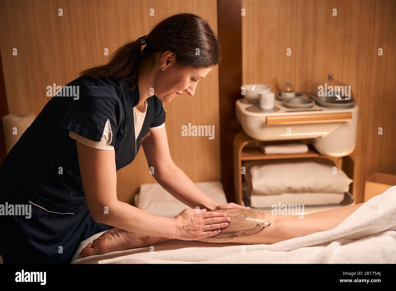 experienced-masseuse-giving-massage-hi-res-stock-photography-and-images