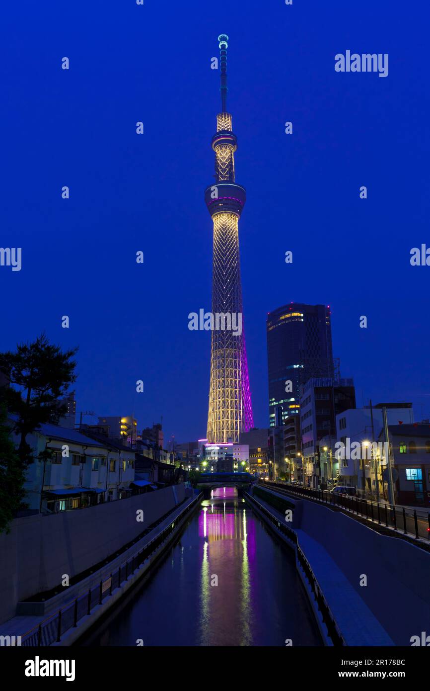 Illuminated Tokyo sky tree seen from Jikkenhashi bridge Stock Photo