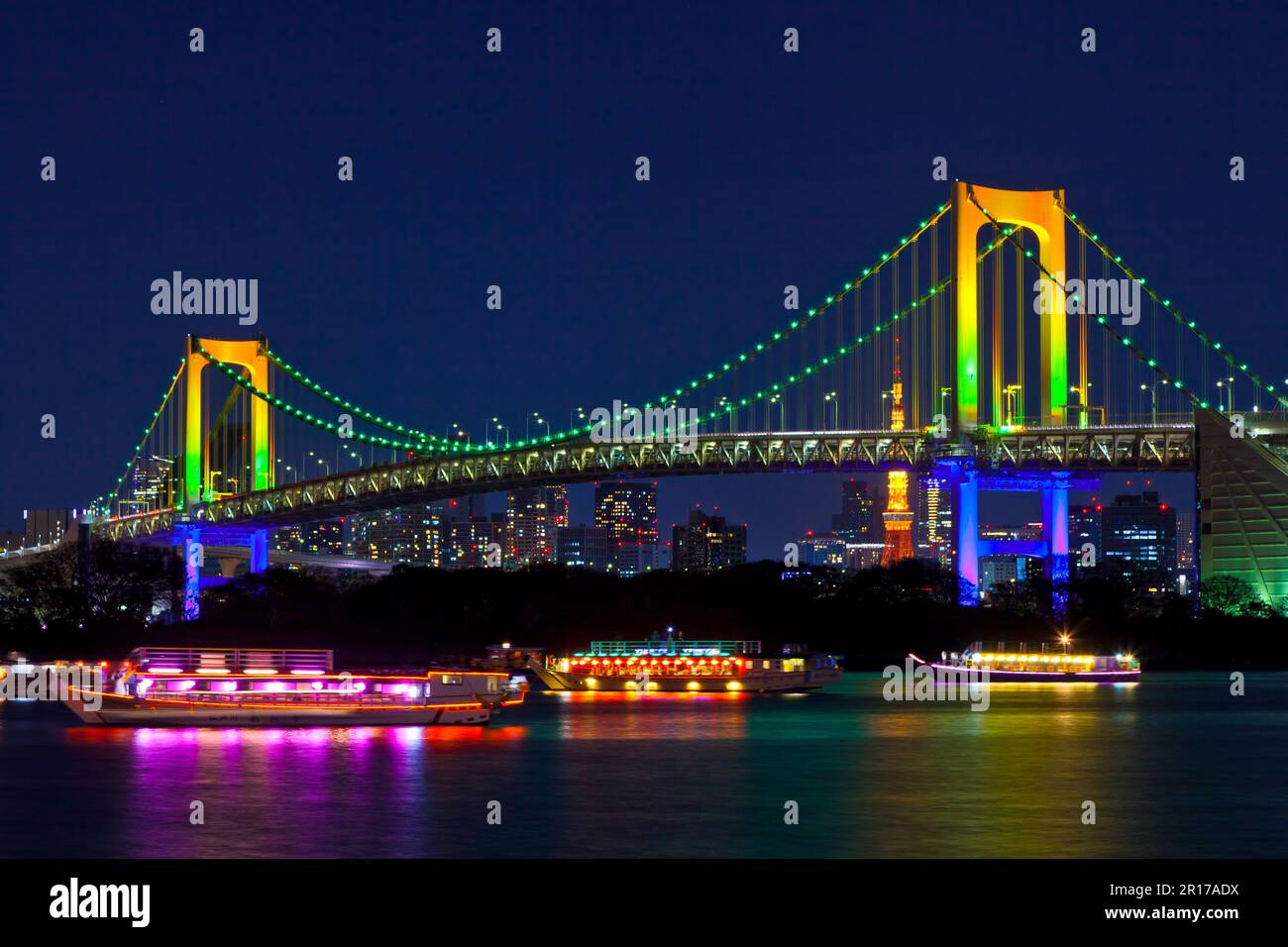 Illuminated Rainbow Bridge seen from Odaiba Stock Photo