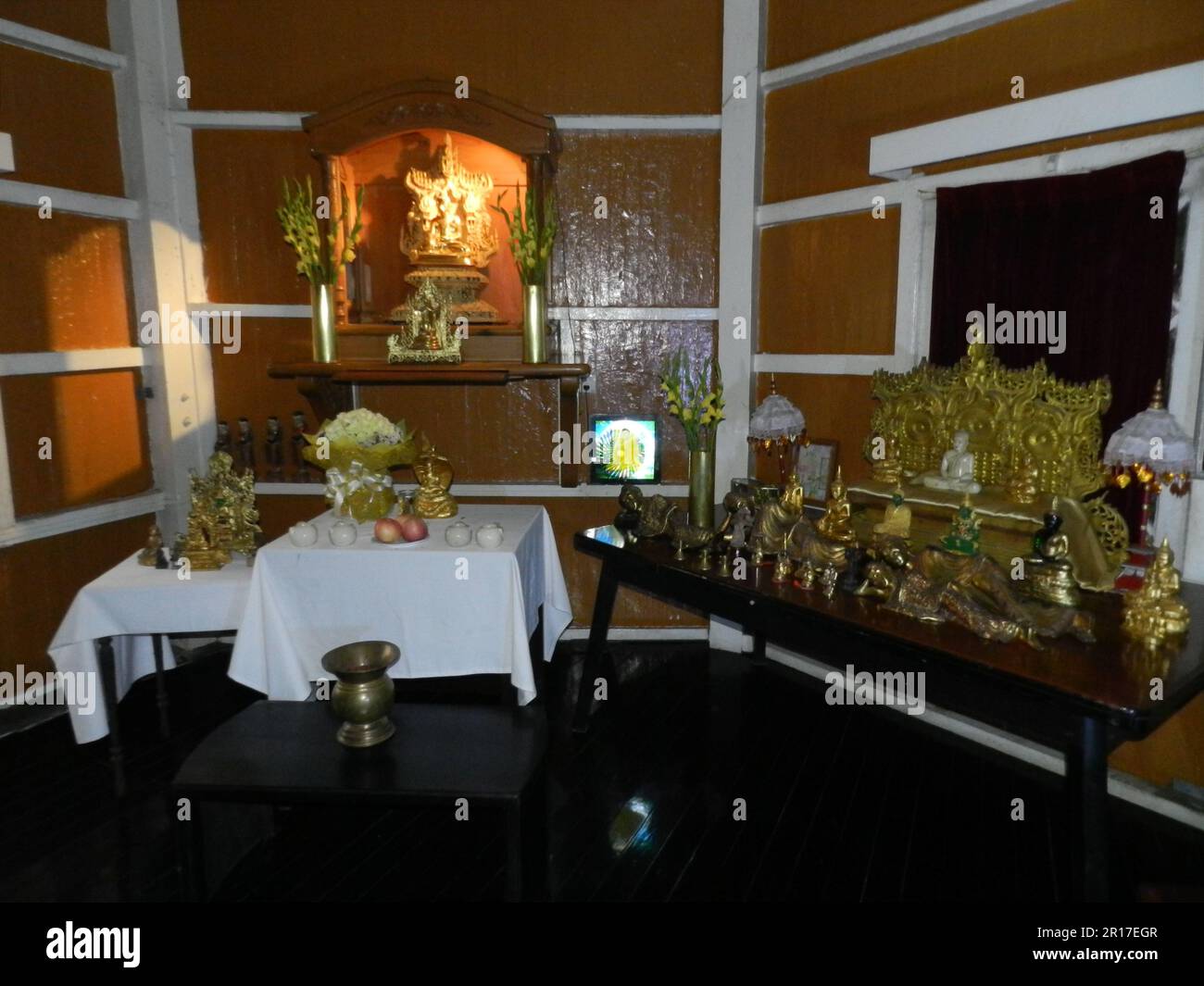 Myanmar, Yangon:  personal shrine in the former home of General Aung San (now the "House of Memories" Restaurant). Stock Photo