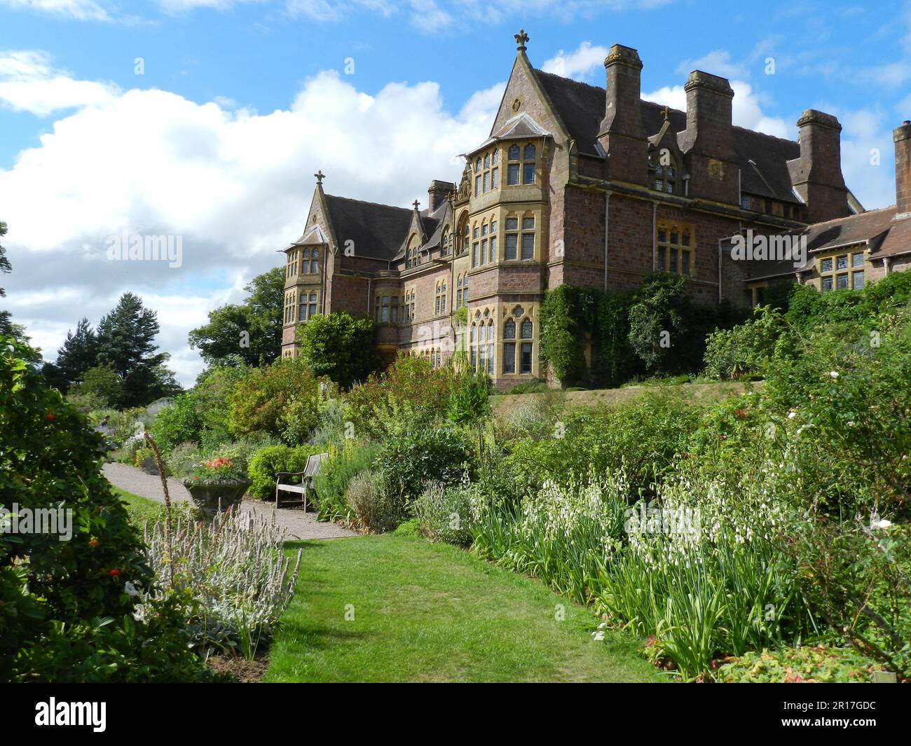England, Devon:  Knightshayes Court and Gardens, traditional home of the Heathcoat-Amory family (National Trust).  View of the house from the South Te Stock Photo