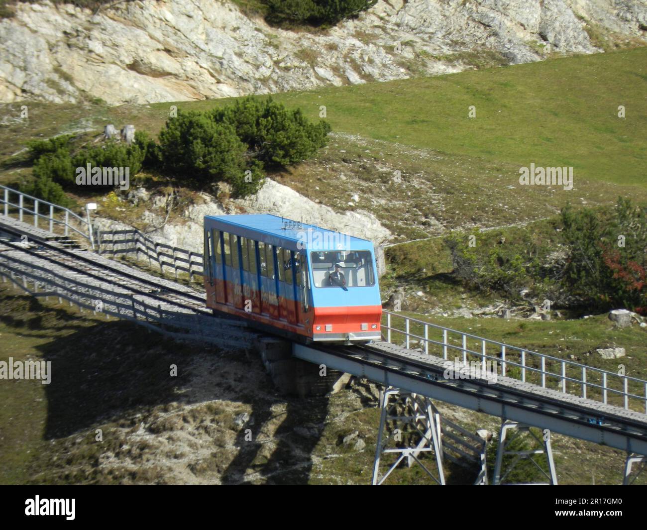 Austria, Tyrol, Seefeld:  teleshot of a funicular car just below the Rosshutte, from the Kaltwassersee (Cold Water Lake). Stock Photo