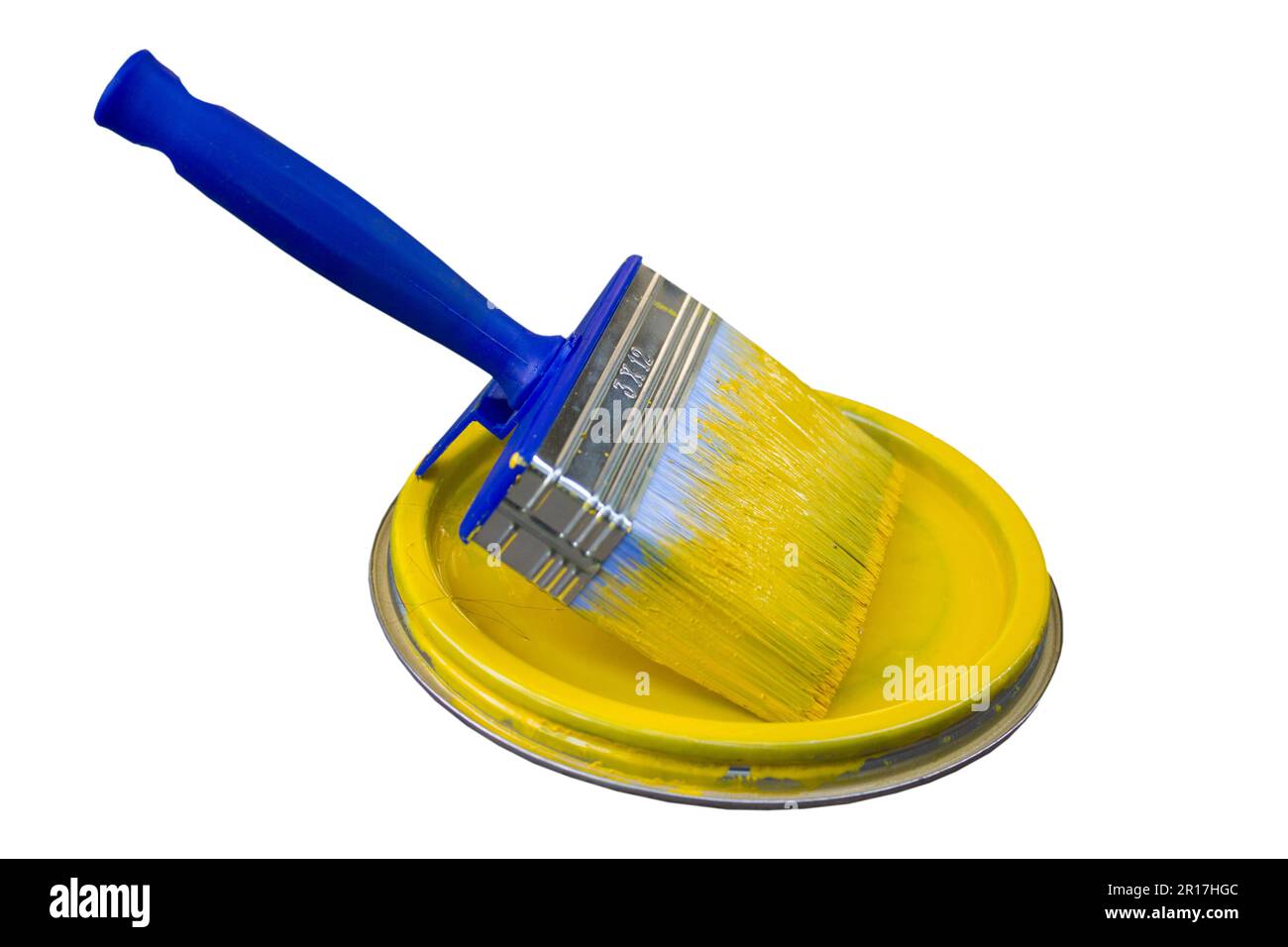 big blue industrial brush for wall painting, yellow paint color Stock
