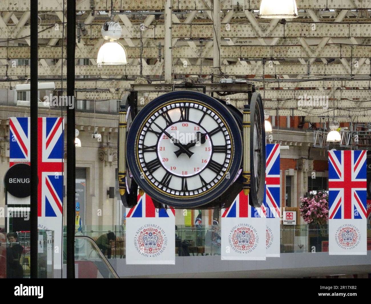 Clock and flags, Union Jacks, at Waterloo railway station, London