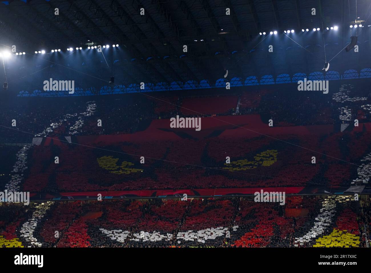 Milan, Italy. 10 May 2023. Fans of AC Milan in sector 'Curva Sud' display a tifo prior to the UEFA Champions League semifinal first leg football match between AC Milan and FC Internazionale. Credit: Nicolò Campo/Alamy Live News Stock Photo