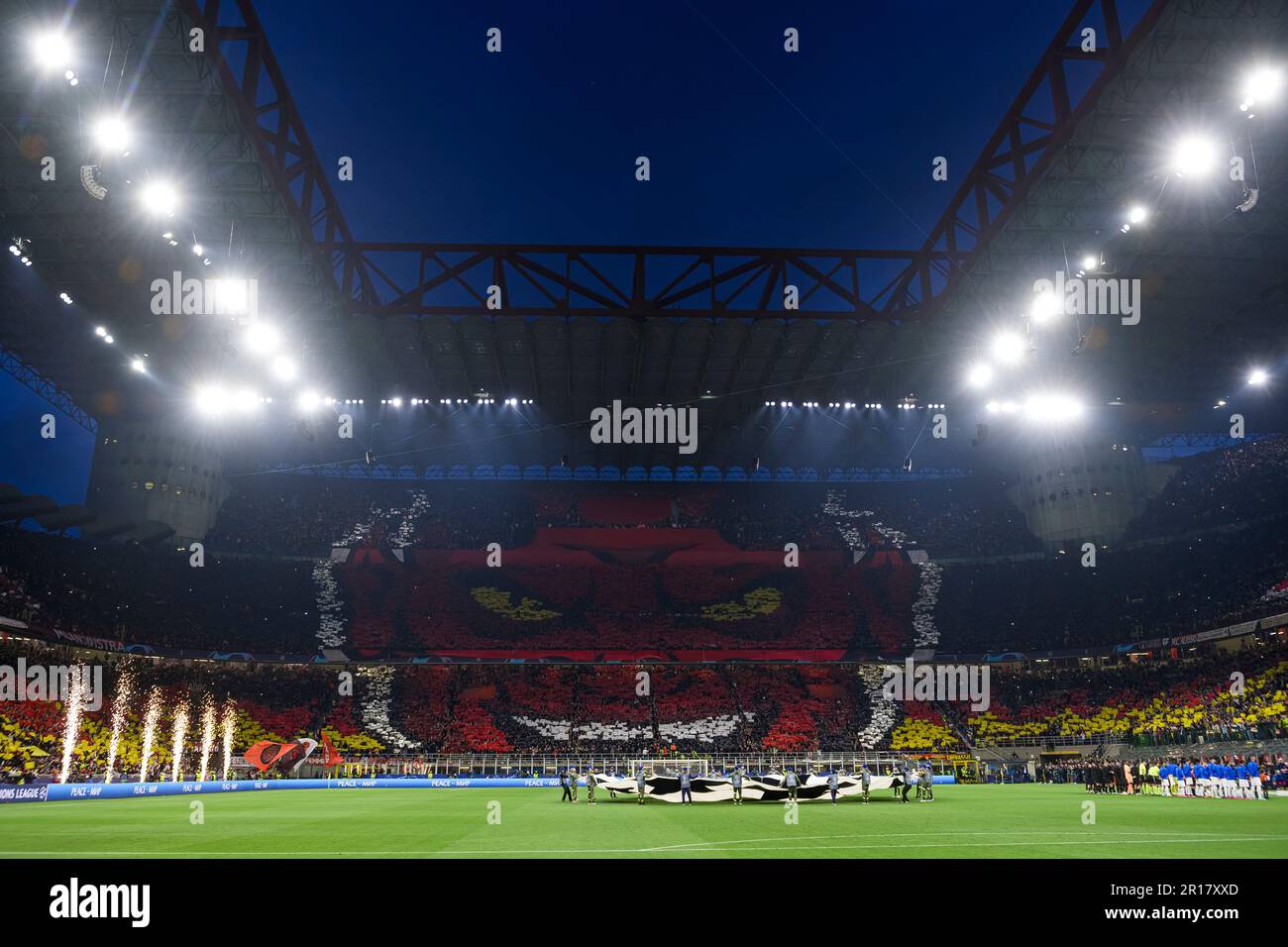 Milan, Italy. 10 May 2023. Fans of AC Milan in sector 'Curva Sud' display a  tifo prior to the UEFA Champions League semifinal first leg football match  between AC Milan and FC, image size:1300x956