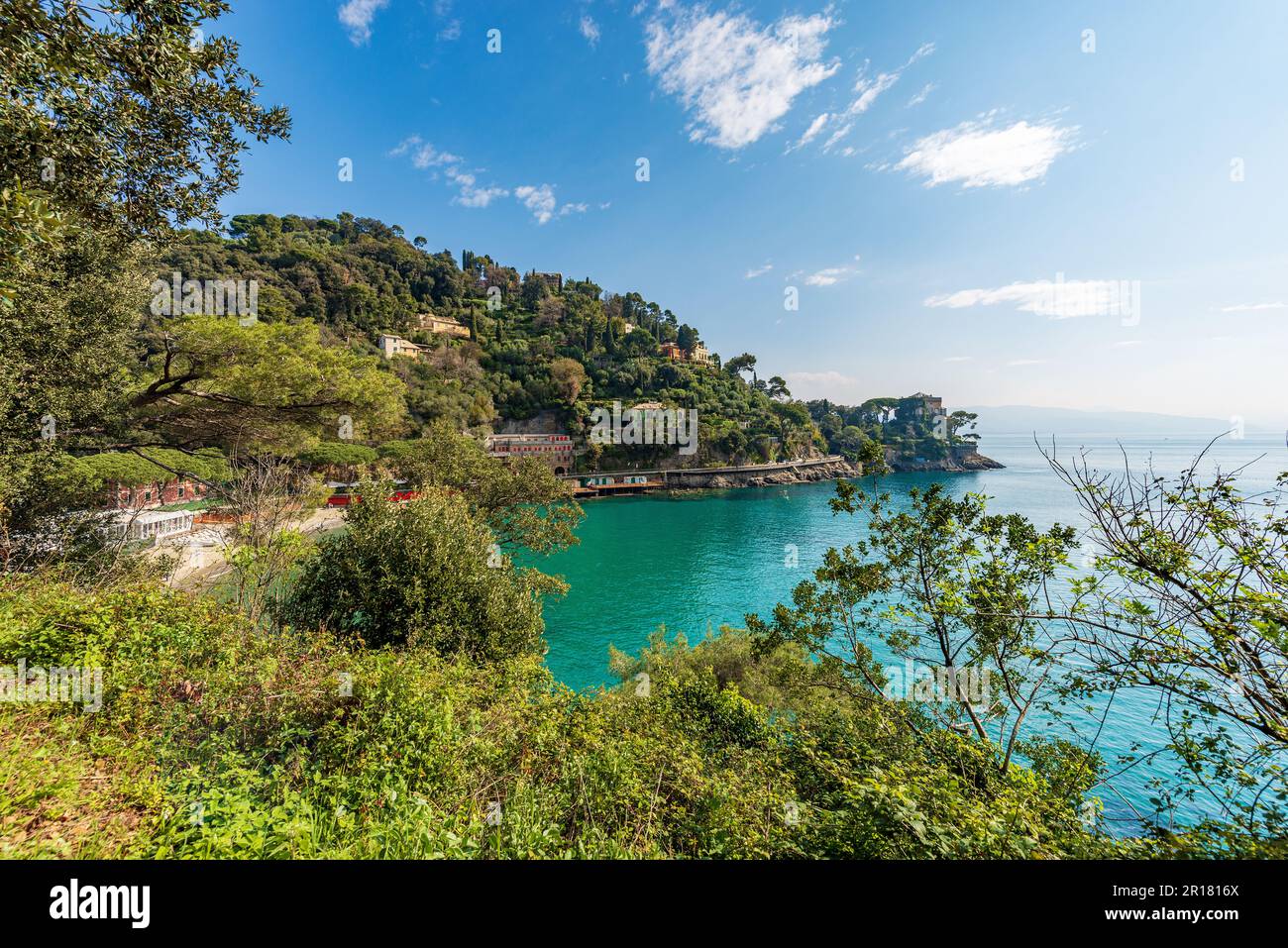 Bay and beach of Paraggi near the Portofino village. Tourist resort in Genoa Province (Genova), Liguria, Italy, Europe. Coast and Mediterranean Sea. Stock Photo