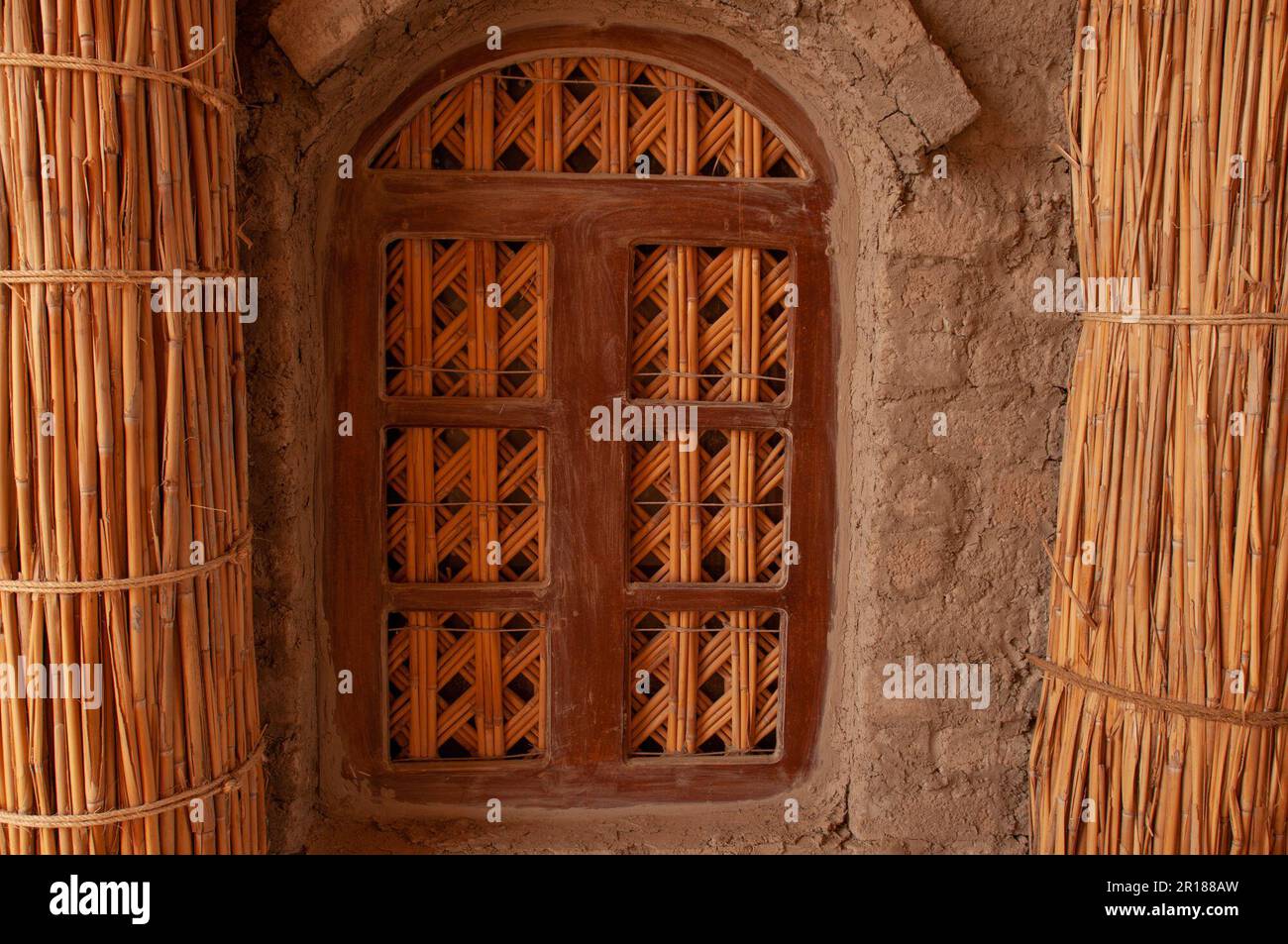 details of window with reed lattice and columns on a building in southern Iraq Stock Photo