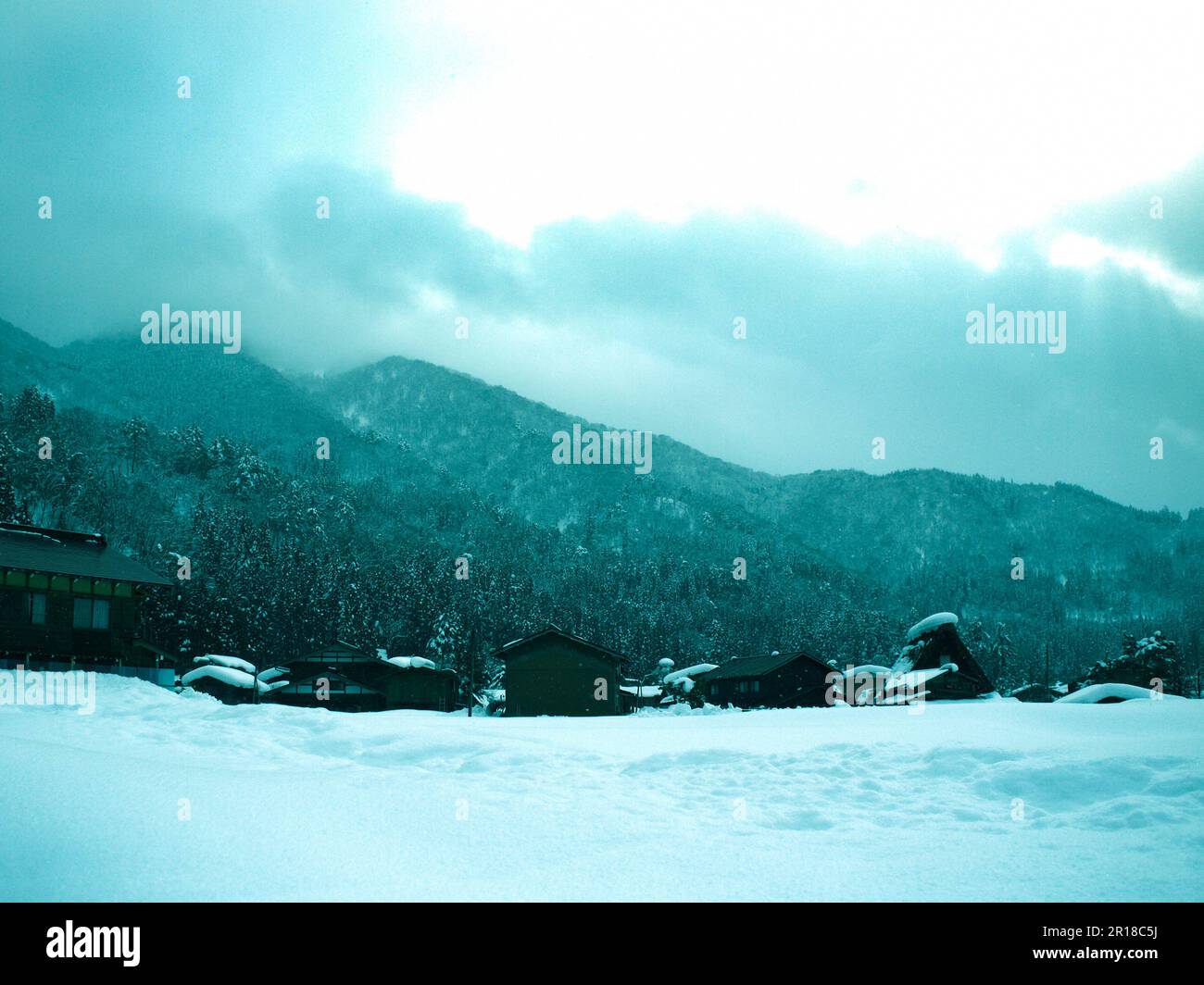 Snowy landscape of mountain village Stock Photo - Alamy
