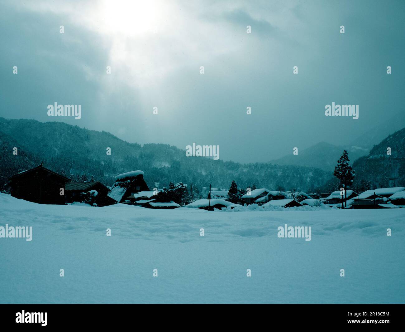 Snowy landscape of mountain village Stock Photo - Alamy